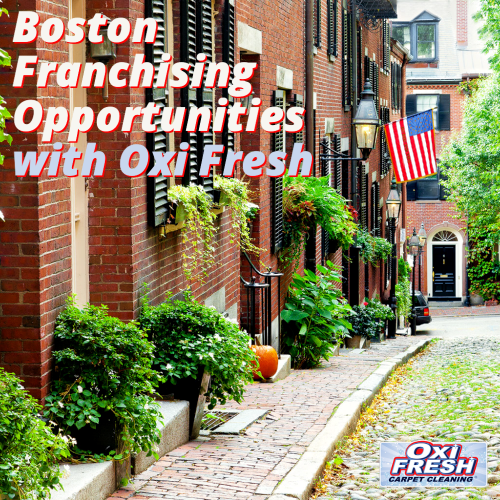 This image shows a street in Boston, surrounded with greenery and brick buildings. In bold and colorful text, it says "Boston Franchising Opportunities with Oxi Fresh" and also features the Oxi Fresh logo.
