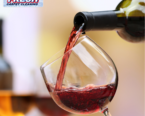 This image shows a bottle of red wine pouring into a tilted, stemmed wine glass and features the Oxi Fresh logo in the upper-left corner.